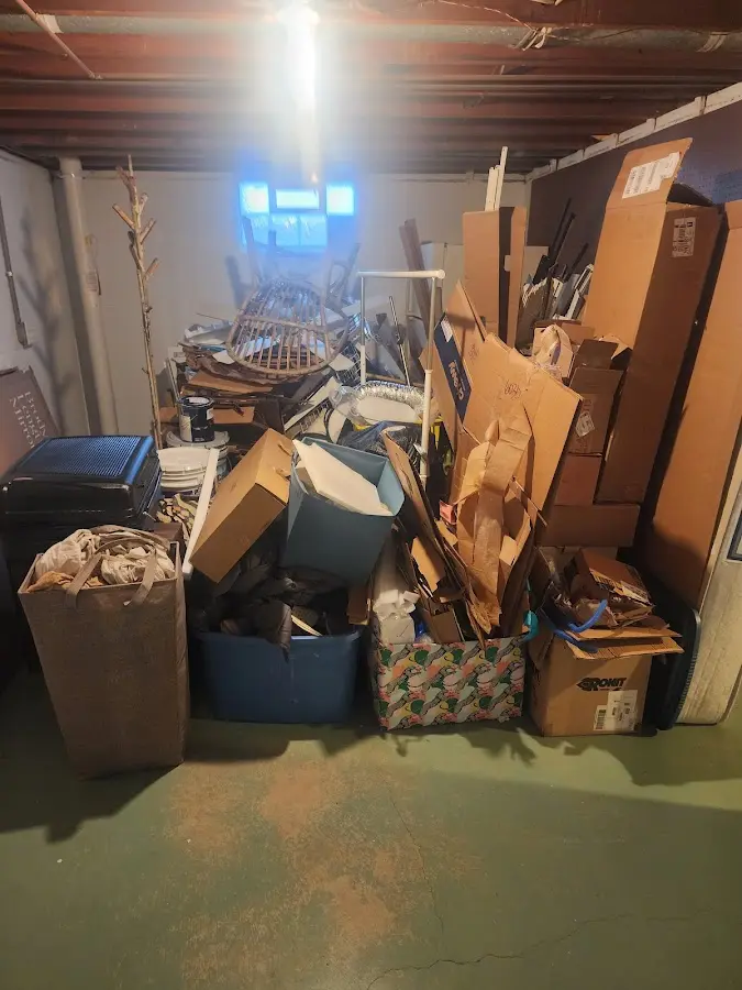 Roll-off dumpster container at job site for 4 Yard Dumpster Rental in Hartford